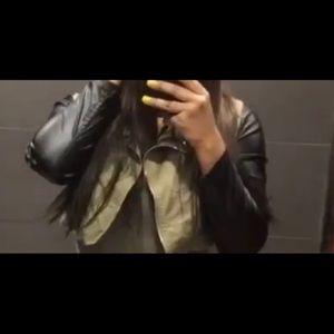 Olive green jacket with leather sleeves!